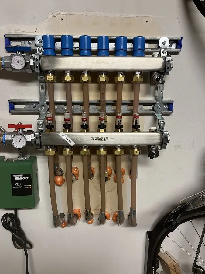 Plumber performing Gas Line Installation at a residential property in Etowah